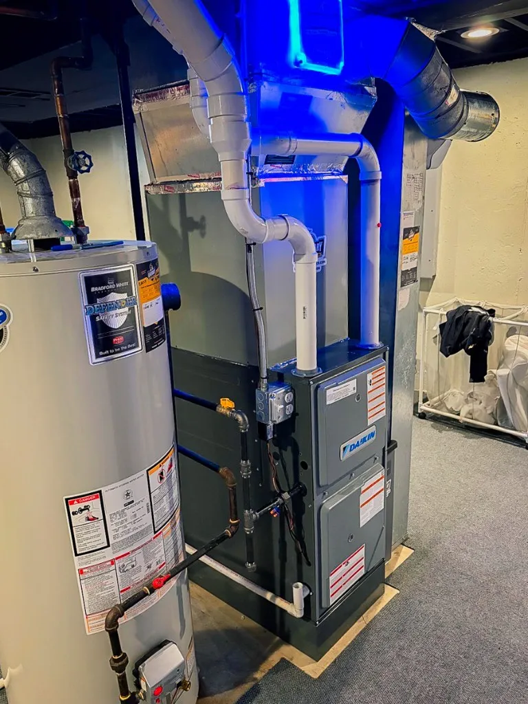 UV air purifier glowing on a Daikin furnace installed by Legendary Service